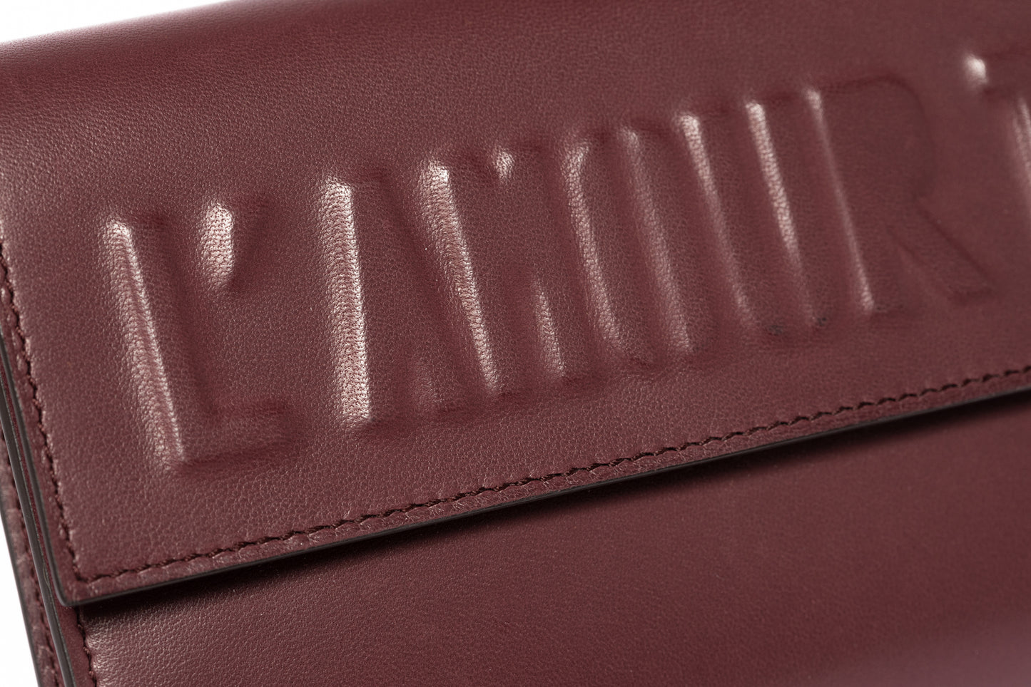 L'AMOUR TUE CLUTCH BAG LAMBSKIN